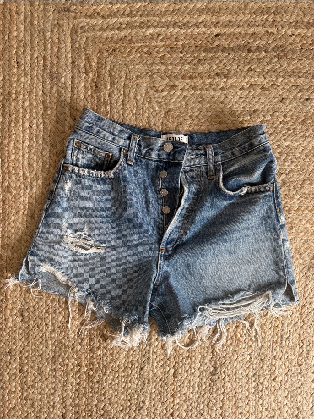 Agolde Distressed High-Rise Denim Shorts in Light Blue Wash